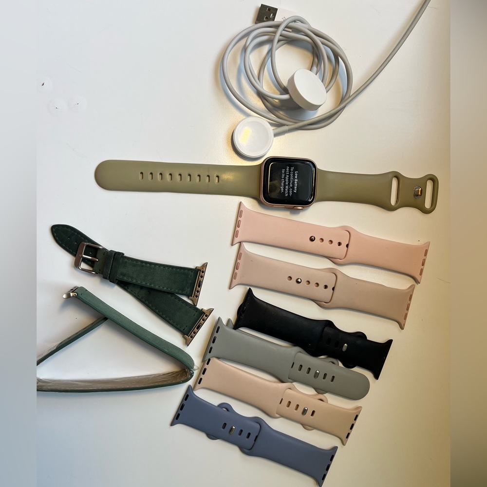 Apple Watch Series 4 40mm with 9 bands and 2 chargers